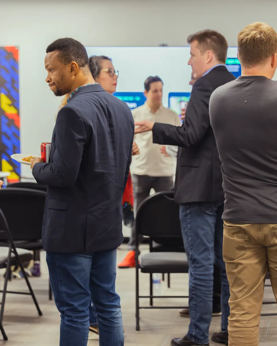 Business owners talking between sessions at an Execution Lab event